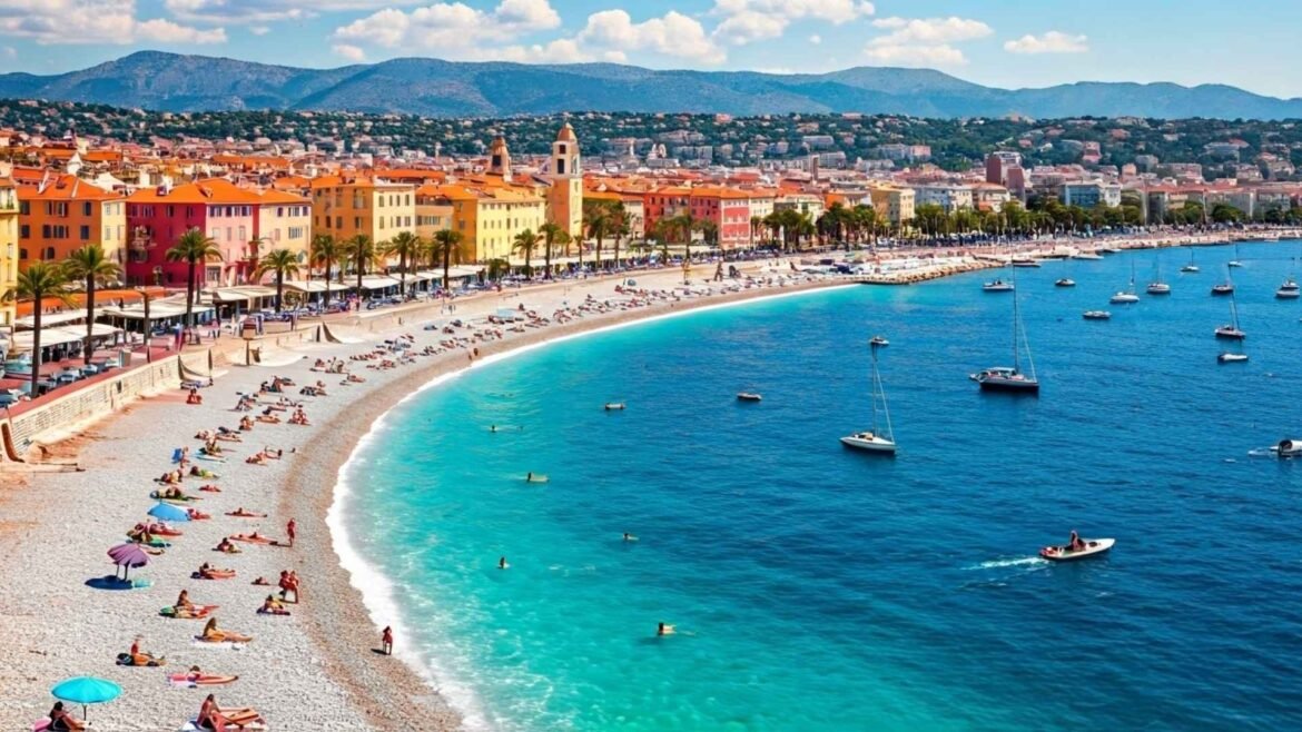 A vibrant panoramic view of Nice, France, showing the famous Promenade des Anglais with colorful buildings, sunbathers on the beach, people swimming in the turquoise sea, and sailboats scattered along the coastline under a clear blue sky.