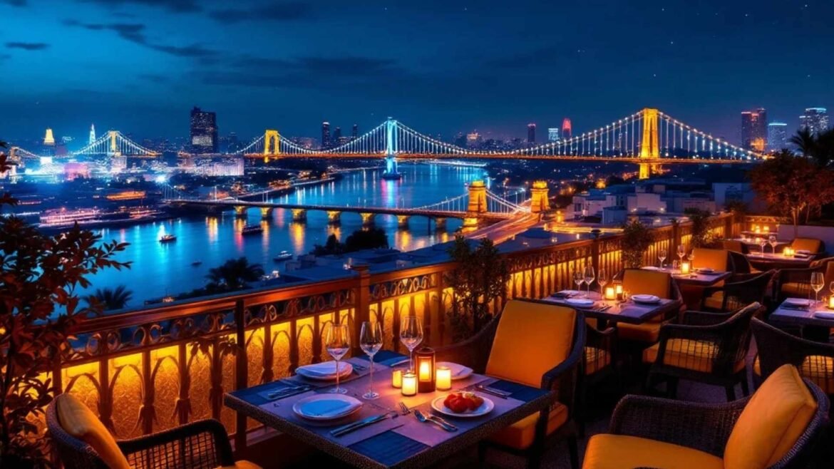 Elegant rooftop restaurant in Cairo with Nile River views at night.