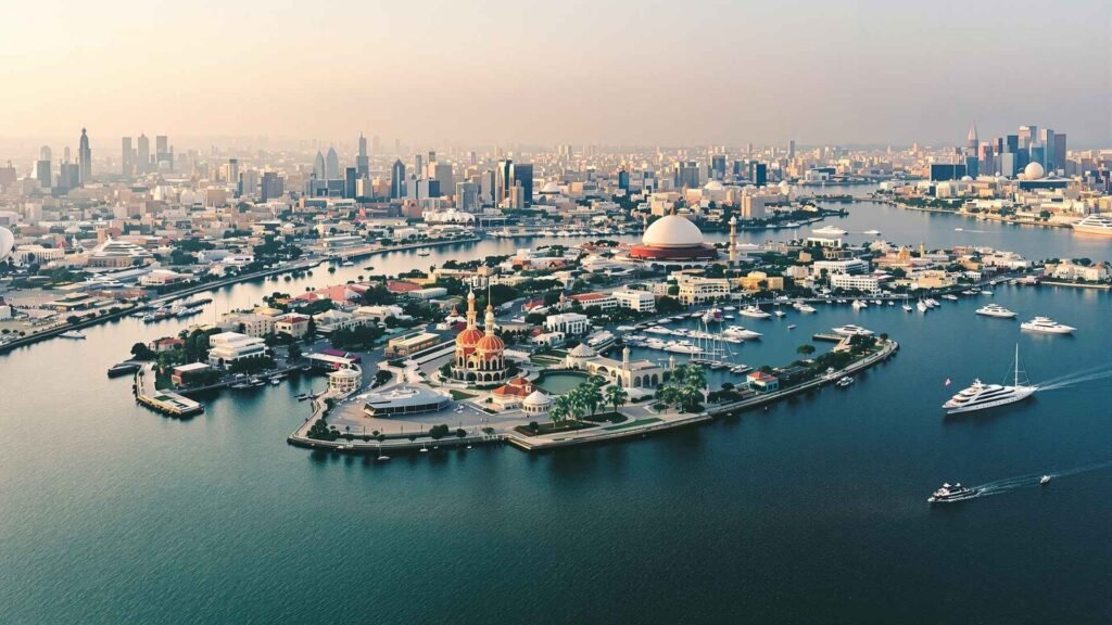 Aerial view of Zamalek Island in Cairo, surrounded by the Nile River with green streets, embassies, and cultural landmarks.