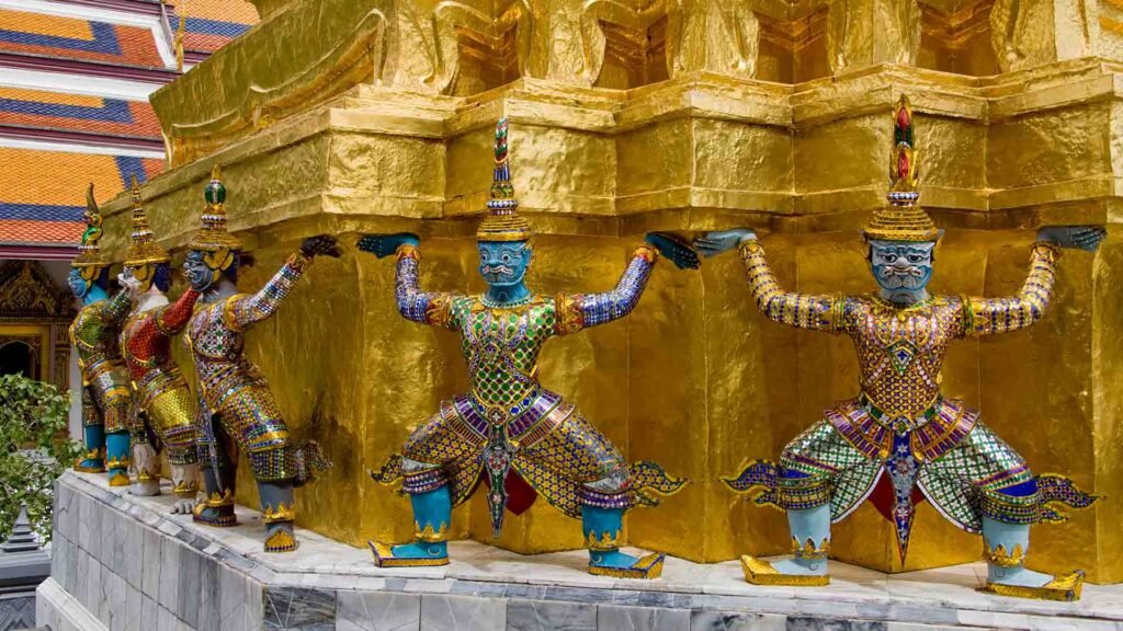 Guardian statues at the Emerald Buddha Temple in Bangkok