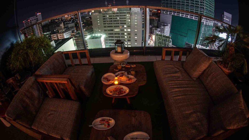 People enjoying late night dining and nightlife in a vibrant urban city setting