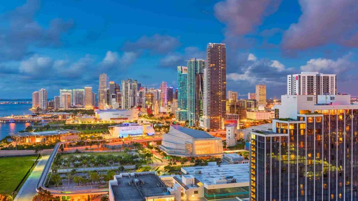 Miami Real Estate- -Miami, Florida skyline featuring modern high-rise buildings and waterfront, representing a global real estate investment market