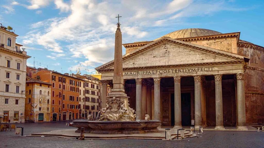 View of the Pantheon basilica in the center of Rome, featuring its iconic columns and historic urban setting