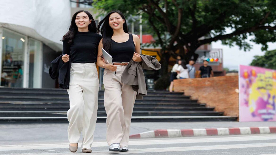 Sukhumvit District Bangkok - Two women leaving a store on a city street in Bangkok