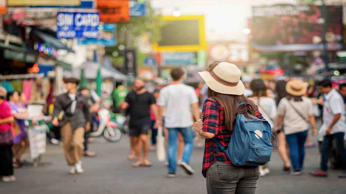 Bangkok Fashion Guide - Young woman walking through a modern shopping district in Bangkok