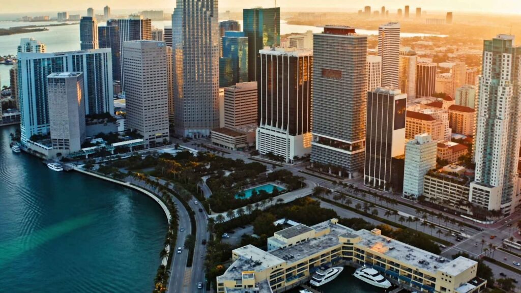 Miami for Digital Nomads skyline view of downtown Miami financial district with modern skyscrapers and Biscayne Bay at sunrise